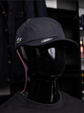 Lacoste Organic Cotton Piqué Cap (specifically in the black or dark navy colorway).