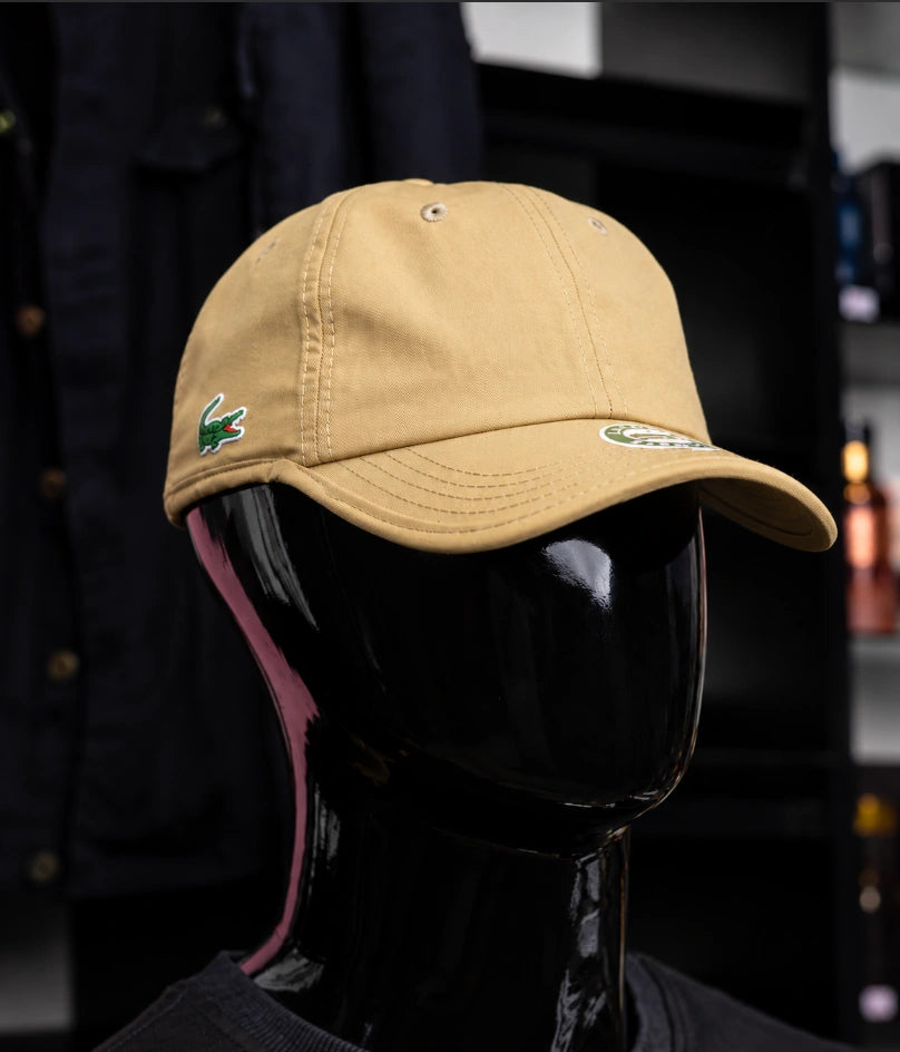 Lacoste Organic Cotton Piqué Cap (specifically in the beige/tan colorway).